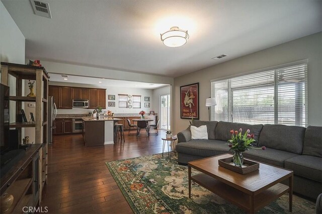 32804 Red Carriage Rd, Winchester, CA 92596 - living room featuring dark wood-type flooring