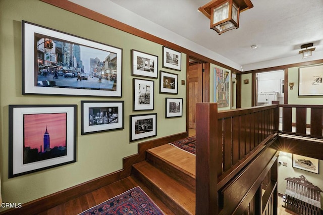 657 Prospect Blvd, Pasadena, CA 91103 - stairway featuring baseboards and wood finished floors