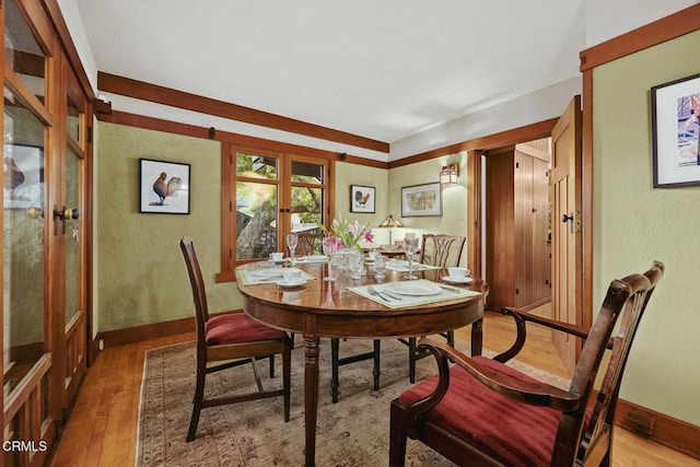 657 Prospect Blvd, Pasadena, CA 91103 - dining room with french doors, wood finished floors, baseboards, and a textured wall