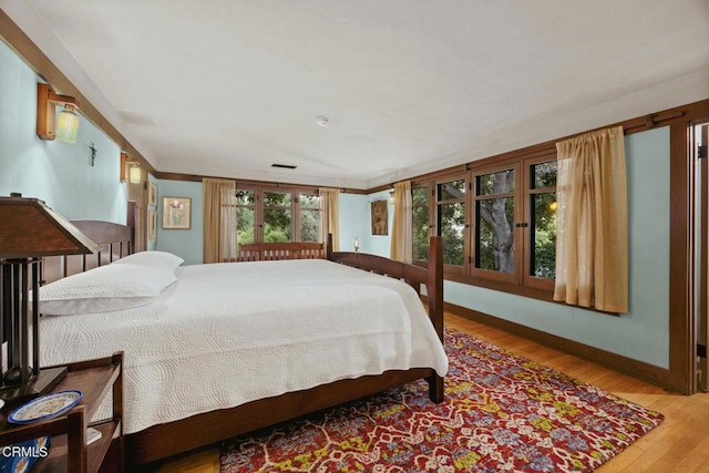 657 Prospect Blvd, Pasadena, CA 91103 - bedroom featuring wood finished floors and baseboards