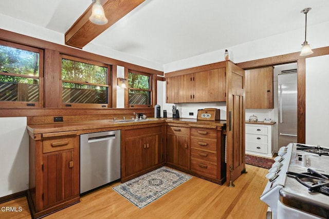 657 Prospect Blvd, Pasadena, CA 91103 - kitchen featuring appliances with stainless steel finishes, light wood-style flooring, plenty of natural light, and a sink