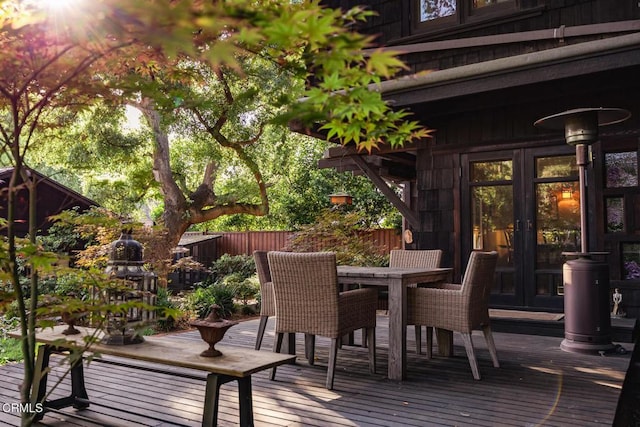 657 Prospect Blvd, Pasadena, CA 91103 - wooden terrace with fence, french doors, and outdoor dining space