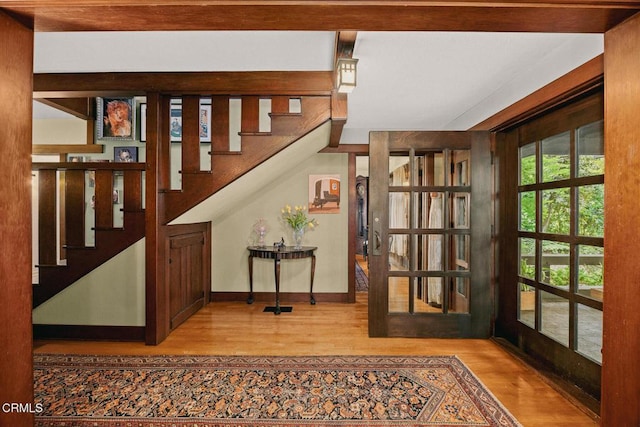 657 Prospect Blvd, Pasadena, CA 91103 - staircase featuring wood finished floors and baseboards