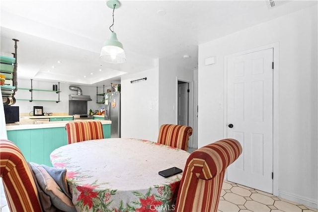 9319 Rowell Ave, Chatsworth, CA 91311 - dining space featuring recessed lighting, baseboards, a raised ceiling, and light flooring