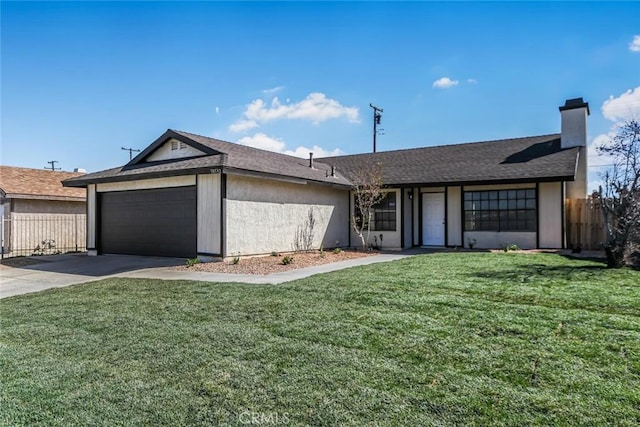 38532 Division St, Palmdale, CA 93550 - ranch-style home featuring an attached garage, driveway, and a chimney