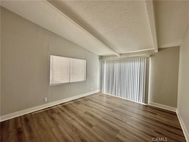 1516 W Burnett St, Long Beach, CA 90810 - unfurnished room featuring wood finished floors, a textured ceiling, healthy amount of natural light, and baseboards