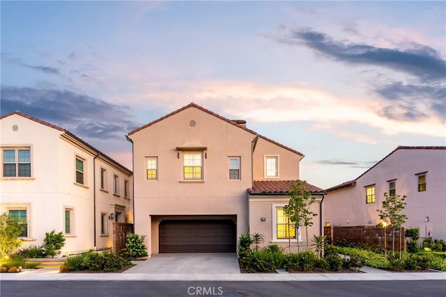 214 Canterbury, Irvine, CA 92618 - view of front of house with a tile roof, stucco siding, a garage, concrete driveway, and fence