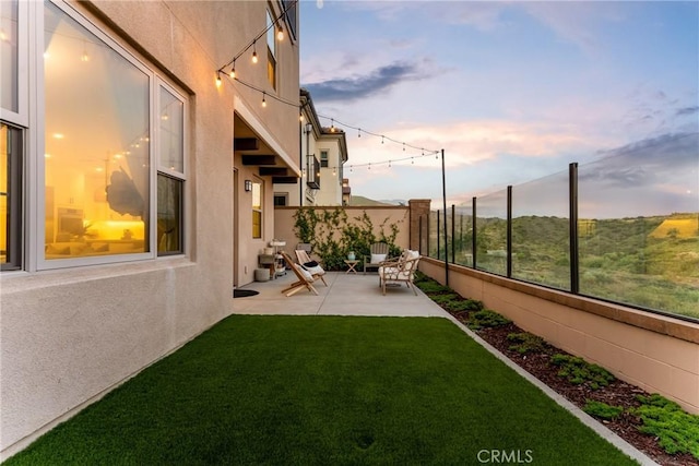 214 Canterbury, Irvine, CA 92618 - yard at dusk with a patio