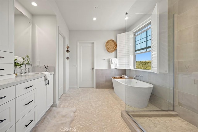 214 Canterbury, Irvine, CA 92618 - full bath with vanity, a freestanding tub, a tile shower, and recessed lighting