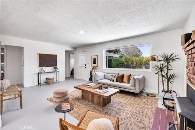 living room with a textured ceiling