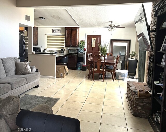 903 Lacon Ave, La Puente, CA 91744 - living room featuring light tile patterned floors and ceiling fan