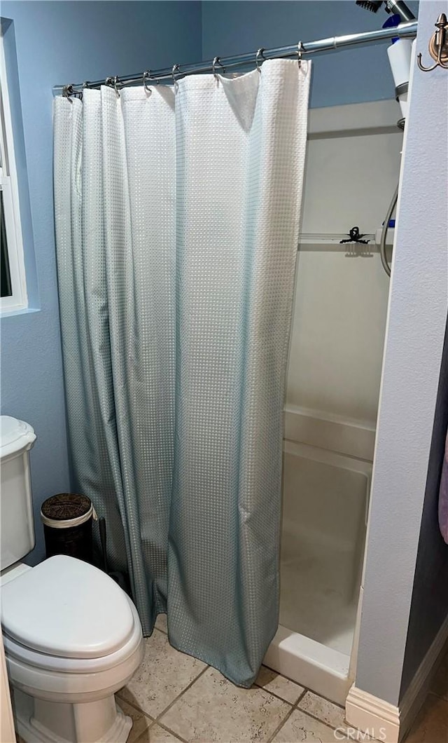 26731 Sinforosa Dr, Mission Viejo, CA 92691 - bathroom featuring a shower with shower curtain and toilet