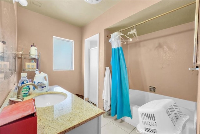 bathroom with vanity, tile patterned flooring, and shower / bath combo with shower curtain