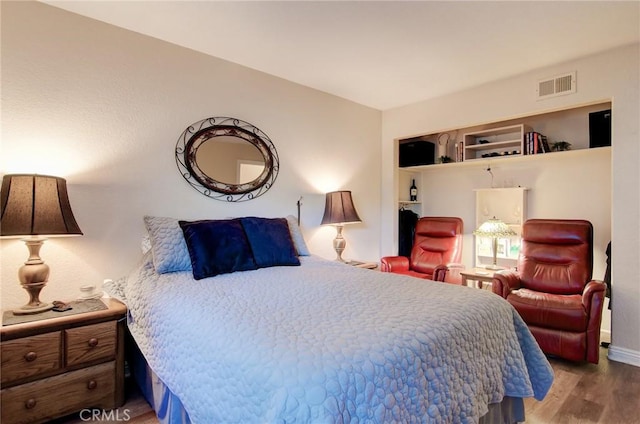 8646 Butte Cir Unit 604B, Huntington Beach, CA 92646 - bedroom featuring wood finished floors and baseboards