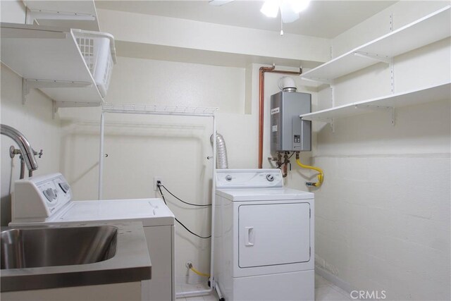 2800 Plaza Del Amo 190, Torrance, CA 90503 - laundry area featuring tankless water heater and washing machine and clothes dryer