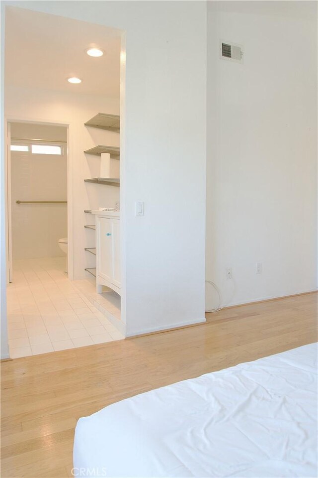 2800 Plaza Del Amo 190, Torrance, CA 90503 - bedroom with a walk in closet, light wood finished floors, and recessed lighting
