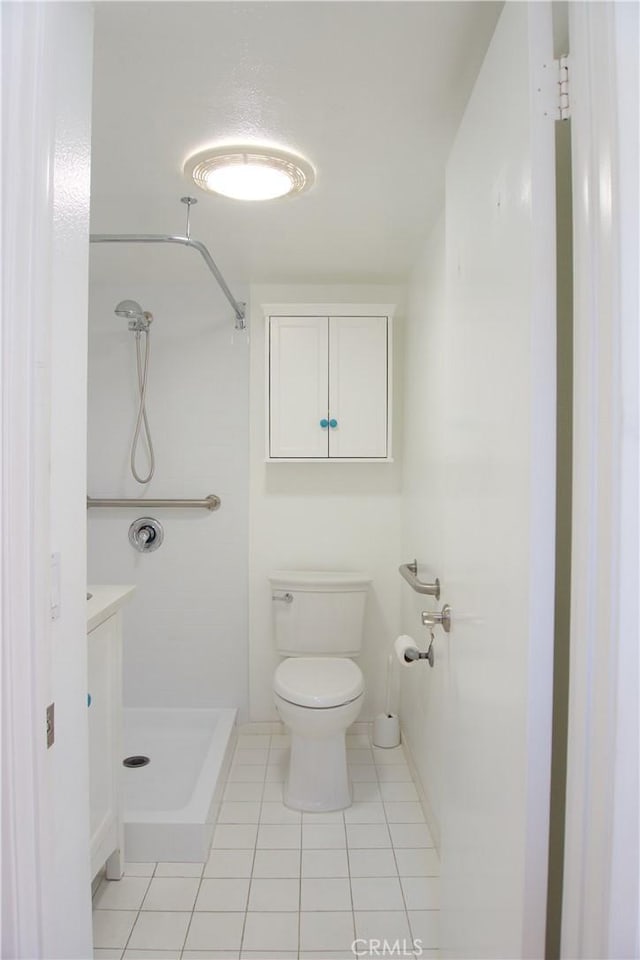 2800 Plaza Del Amo 190, Torrance, CA 90503 - bathroom with a shower stall, toilet, tile patterned flooring, and baseboards