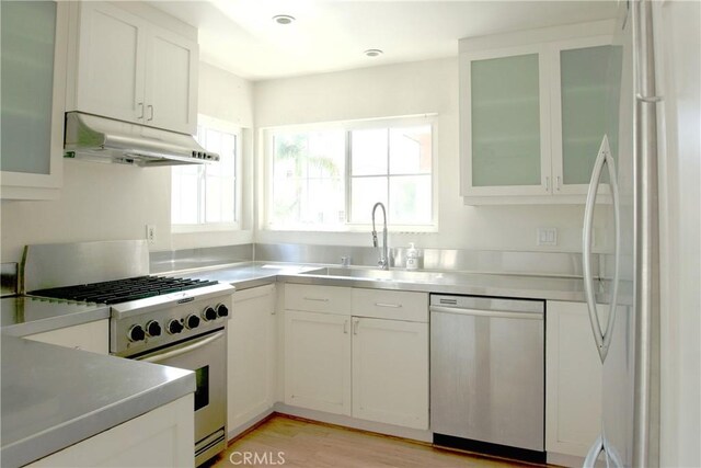 2800 Plaza Del Amo 190, Torrance, CA 90503 - kitchen with stainless steel appliances, under cabinet range hood, plenty of natural light, and a sink