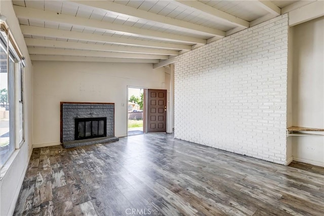 25189 Gentian Ave, Moreno Valley, CA 92551 - unfurnished living room featuring wood finished floors, a fireplace, baseboards, and brick wall