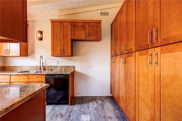 25189 Gentian Ave, Moreno Valley, CA 92551 - kitchen featuring black dishwasher, a sink, wood finished floors, stone counters, and baseboards