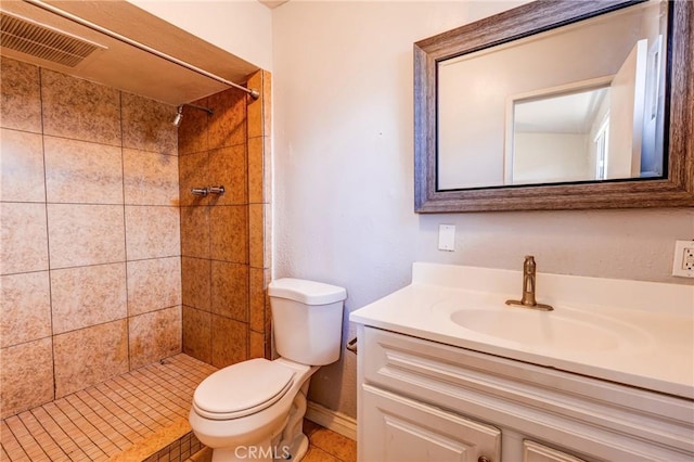 25189 Gentian Ave, Moreno Valley, CA 92551 - bathroom featuring toilet, vanity, and tiled shower
