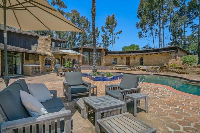 15390 Las Planideras, Rancho Santa Fe, CA 92067 - view of patio / terrace with outdoor lounge area and an outdoor pool