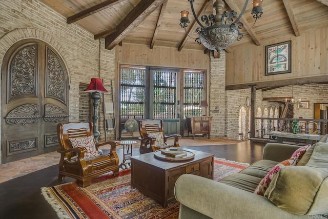 15390 Las Planideras, Rancho Santa Fe, CA 92067 - living area featuring wood ceiling, high vaulted ceiling, beamed ceiling, and brick wall