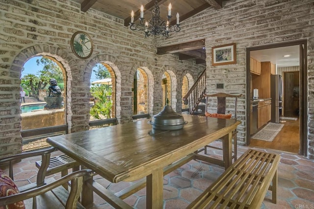 15390 Las Planideras, Rancho Santa Fe, CA 92067 - dining space featuring beam ceiling, wooden ceiling, a chandelier, high vaulted ceiling, and stairs