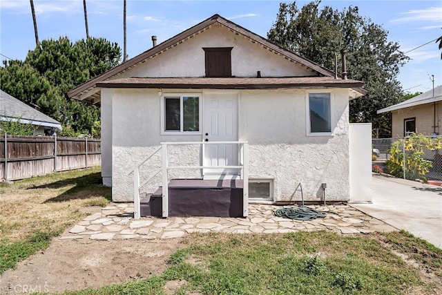 970 E 6th St, Pomona, CA 91766 - back of property featuring stucco siding