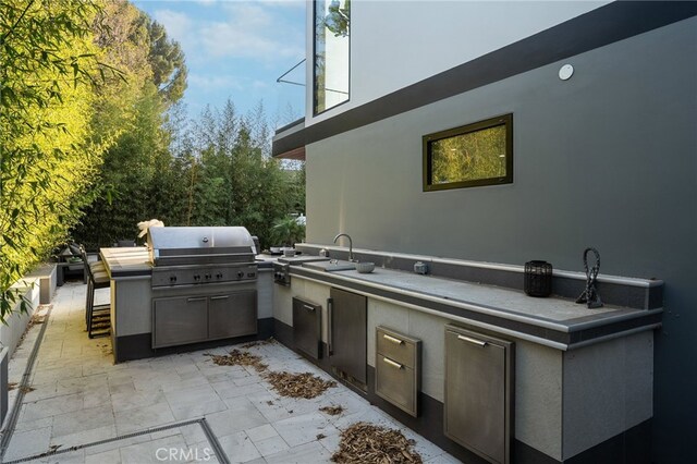 38221/2 Laurel Canyon Blvd, Studio City, CA 91604 - view of patio featuring an outdoor kitchen, area for grilling, and a sink