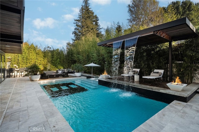 38221/2 Laurel Canyon Blvd, Studio City, CA 91604 - outdoor pool with a patio area and an outdoor living space with a fire pit
