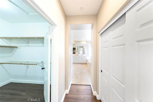 107 Plaza Via Sol, San Clemente, CA 92673 - corridor featuring wood finished floors and baseboards