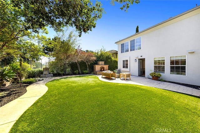 107 Plaza Via Sol, San Clemente, CA 92673 - view of grassy yard with an outdoor living space with a fireplace and a patio