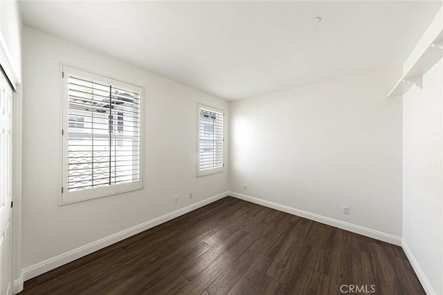 107 Plaza Via Sol, San Clemente, CA 92673 - empty room featuring dark wood-type flooring and baseboards