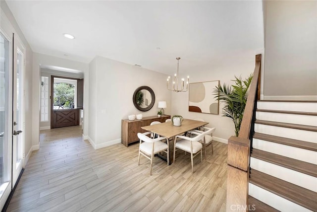 107 Plaza Via Sol, San Clemente, CA 92673 - dining area with a chandelier, baseboards, stairs, light wood-type flooring, and recessed lighting
