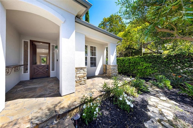 107 Plaza Via Sol, San Clemente, CA 92673 - doorway to property with stucco siding and stone siding