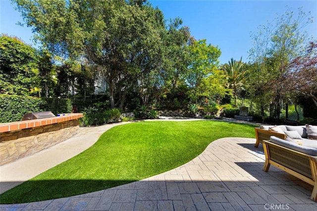 107 Plaza Via Sol, San Clemente, CA 92673 - view of grassy yard with a patio area, outdoor lounge area, and view of scattered trees