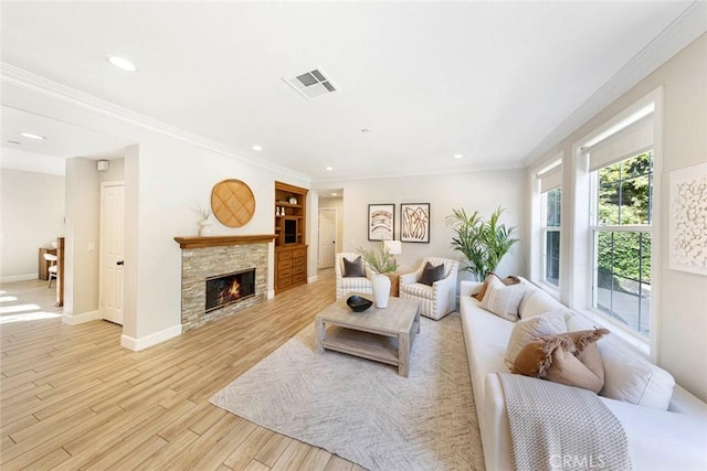 107 Plaza Via Sol, San Clemente, CA 92673 - living area with light wood-style floors, a fireplace, recessed lighting, baseboards, and ornamental molding