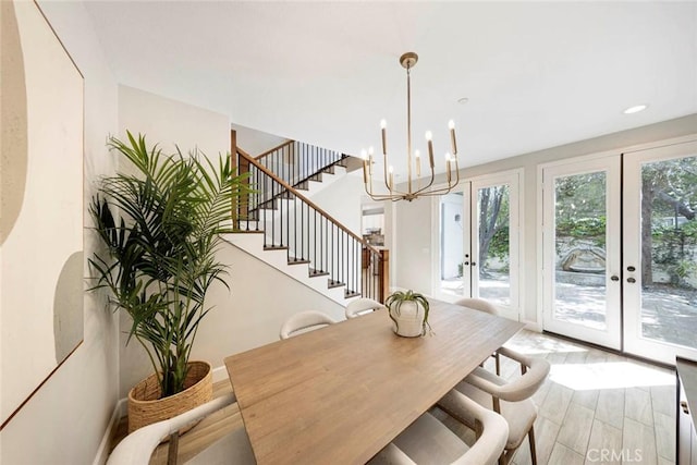 107 Plaza Via Sol, San Clemente, CA 92673 - dining room with french doors, a chandelier, stairs, light wood-style flooring, and recessed lighting