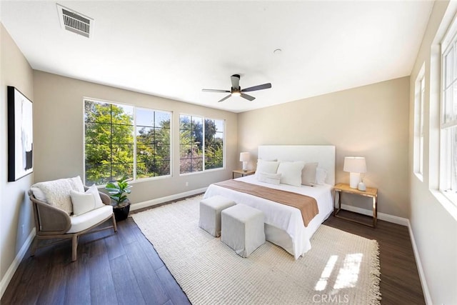 107 Plaza Via Sol, San Clemente, CA 92673 - bedroom with baseboards, dark wood finished floors, and ceiling fan