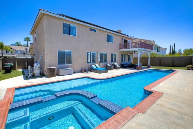 26149 Manzanita St, Murrieta, CA 92563 - view of pool featuring a pool with connected hot tub, a ceiling fan, outdoor lounge area, a patio area, and a fenced backyard