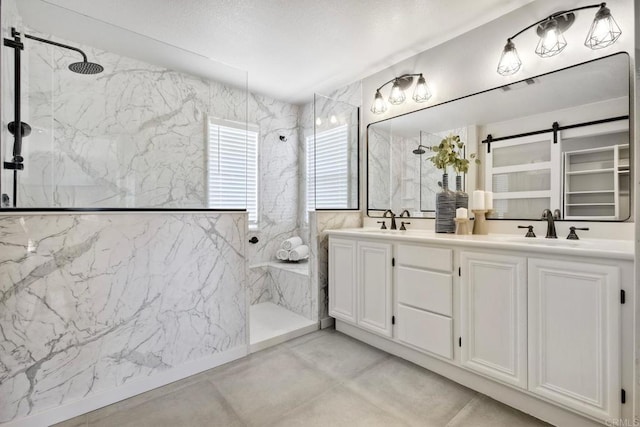 26149 Manzanita St, Murrieta, CA 92563 - bathroom featuring a marble finish shower, double vanity, and concrete flooring