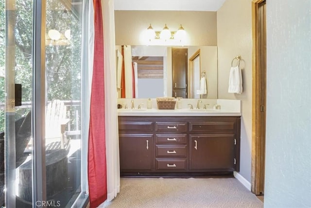 1033 Nadelhorn Dr, Lake Arrowhead, CA 92352 - bathroom featuring double vanity and baseboards