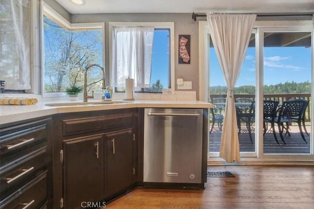 1033 Nadelhorn Dr, Lake Arrowhead, CA 92352 - kitchen featuring dishwasher, wood finished floors, light countertops, and dark brown cabinets