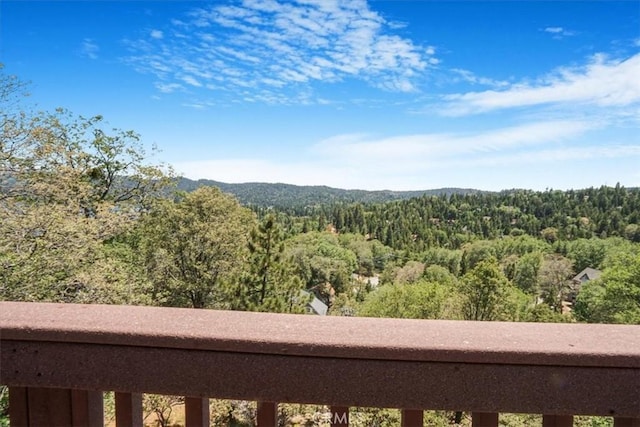 1033 Nadelhorn Dr, Lake Arrowhead, CA 92352 - view of mountain background featuring a heavily wooded area