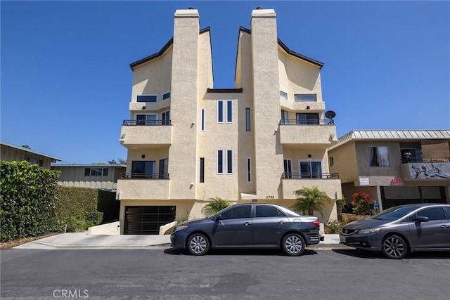 view of property featuring an attached garage