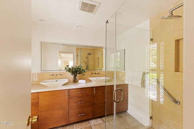 756 Linda Vista Ave, Pasadena, CA 91103 - bathroom featuring a stall shower, double vanity, tile patterned floors, and backsplash