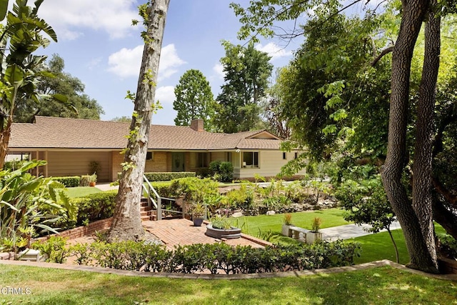 756 Linda Vista Ave, Pasadena, CA 91103 - view of front of home featuring a front lawn and a chimney