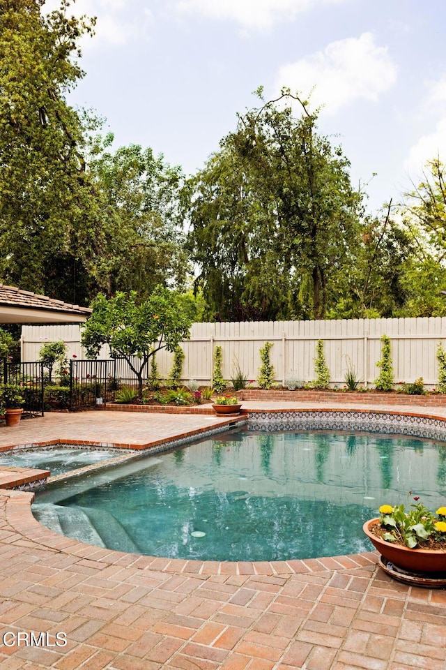 756 Linda Vista Ave, Pasadena, CA 91103 - view of pool with fence and a pool with connected hot tub