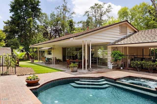 756 Linda Vista Ave, Pasadena, CA 91103 - view of pool with an in-ground hot tub, fence, and a patio area
